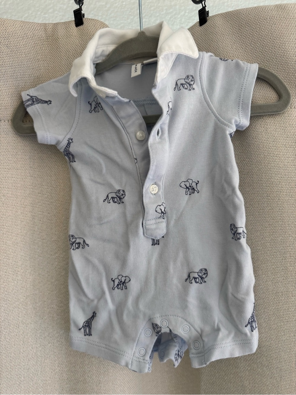Janie and Jack Light Blue Polo Onesie with Navy Animal Motif